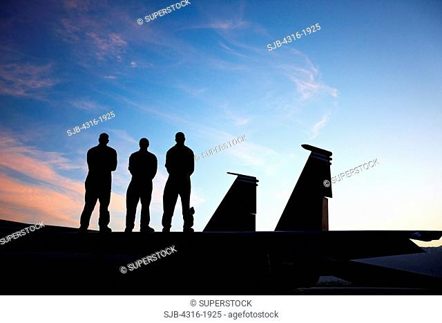 Aviators Stand Atop an F-15E Strike Eagle
