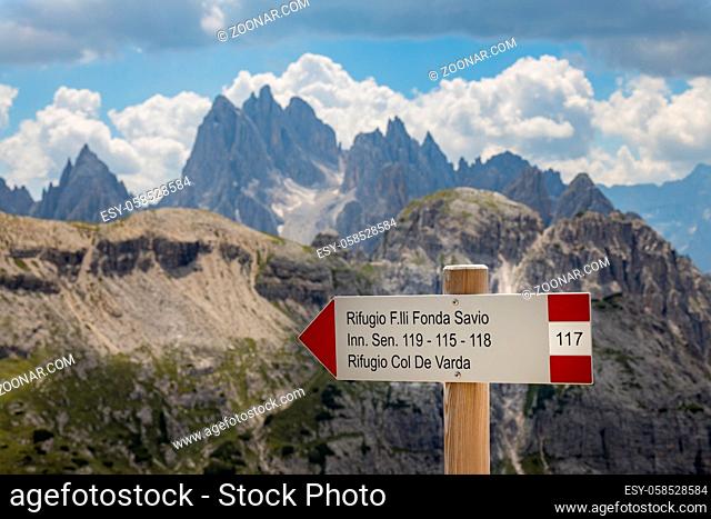 Refuge sign in front of the Three Peaks in the Dolomites