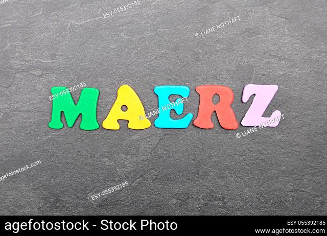 Term from colorful letters on slate board