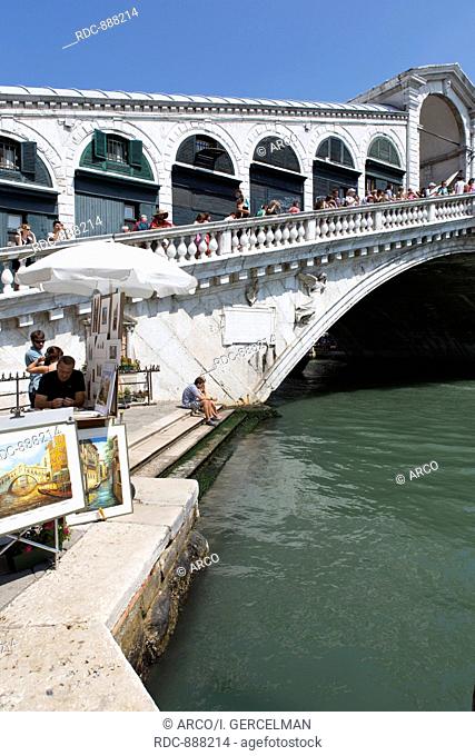 Venice, Italy - August 14, 2012: Touristson Rialto Bridge in Venice, Italy