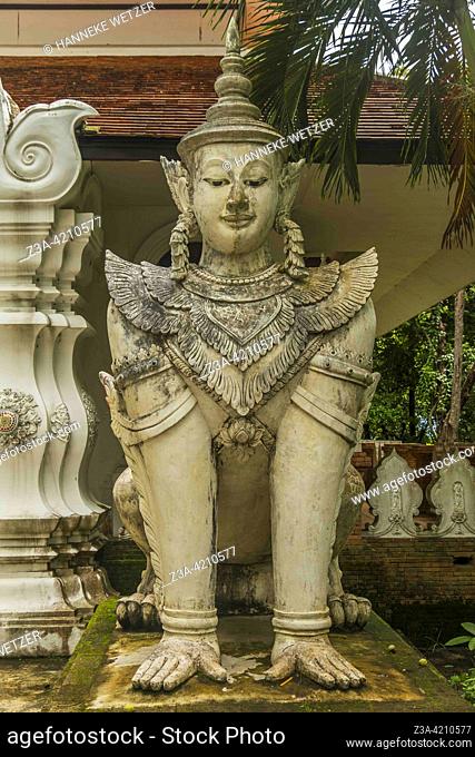 Mythological creature statue at a hidden temple at Wat Pha Lat (temple on the slanting rock) in Chiang Mai, Thailand. Wat Pha Lat became a popular resting place...