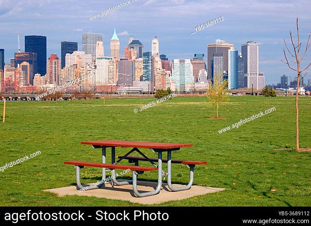 A lone picnic table in Liberty State Park in Jersey city, New Jersey provides a marvelous view of Lower Manhattan