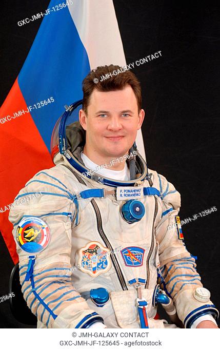 Cosmonaut Roman Romanenko, Expedition 2021 flight engineer, attired in a Russian Sokol launch and entry suit, takes a break from training in Star City
