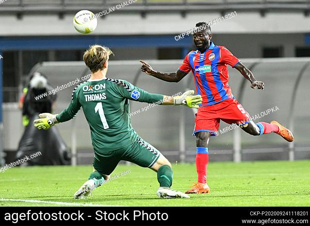 From left goalie of Sonderjyske LAWRENCE THOMAS, JOEL KAYAMBA of Viktoria Plzen in action during the match of Football Champions League playoff round
