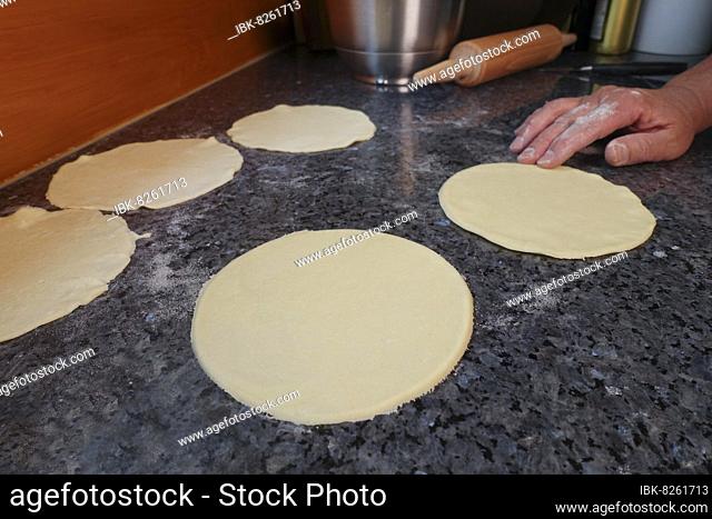 Swabian cuisine, preparing yeast yeast dough for Fellbach flacka with bacon, hearty pastry, Swabian pizza, salty yeast dough, making the individual patches