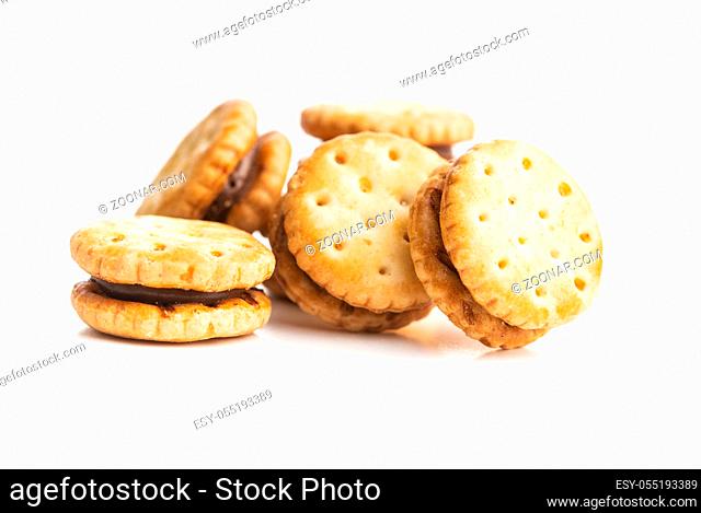 Mini cream sandwich cookies isolated on white background