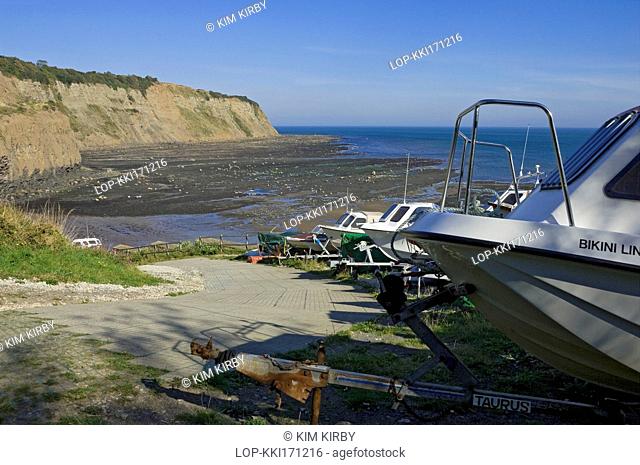 England, North Yorkshire, Robin Hoods Bay. Boats mounted on trailers by the slipway at Robin Hoods Bay