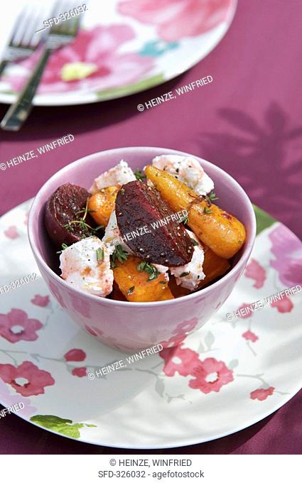 Salad of baked beetroot and carrot with goat's cheese