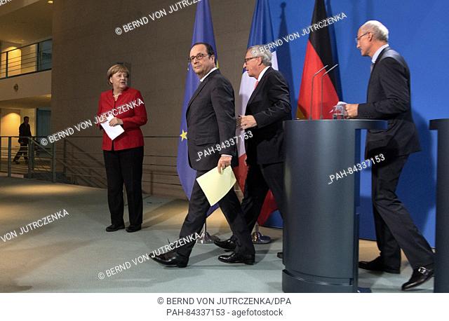 German Chancellors Angela Merkel (l, CDU), French President Francois Hollande (2.f.l), Präsident of the EU commission Jean-Claude Juncker (2.f