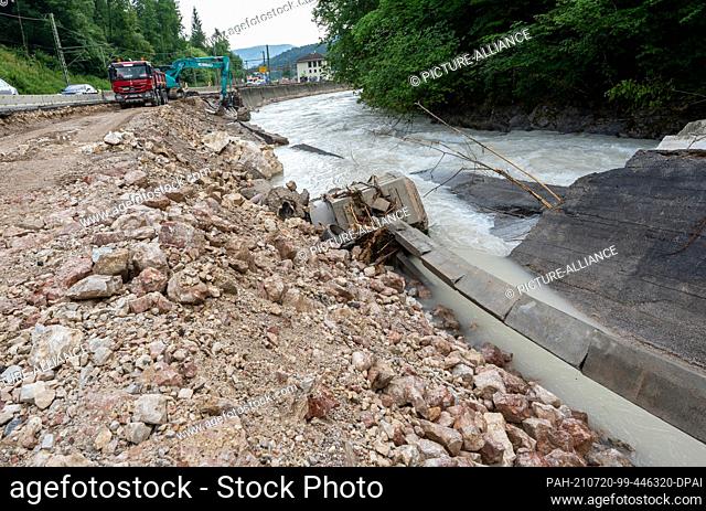 20 July 2021, Bavaria, Berchtesgaden: Shortly before the village of Berchtesgaden, half of the federal road 20 has been swept away by the Ramsauer Ache