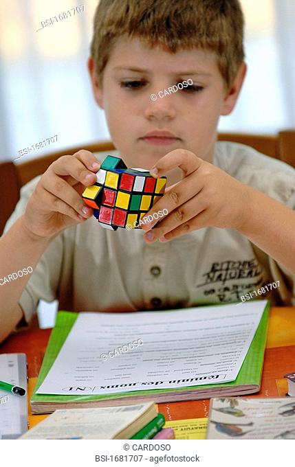 CHILD PLAYING INDOORS Model. Rubicube