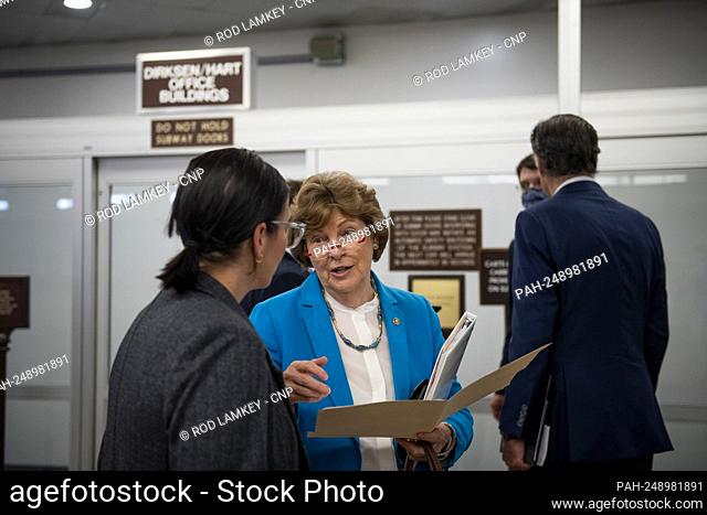United States Senator Jeanne Shaheen (Democrat of New Hampshire) talks with staff as Senators make their way through the Senate subway during a vote at the US...