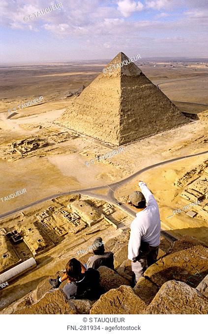 Tourists looking at Pyramid of Gizeh, Kairo, Egypt, elevated view