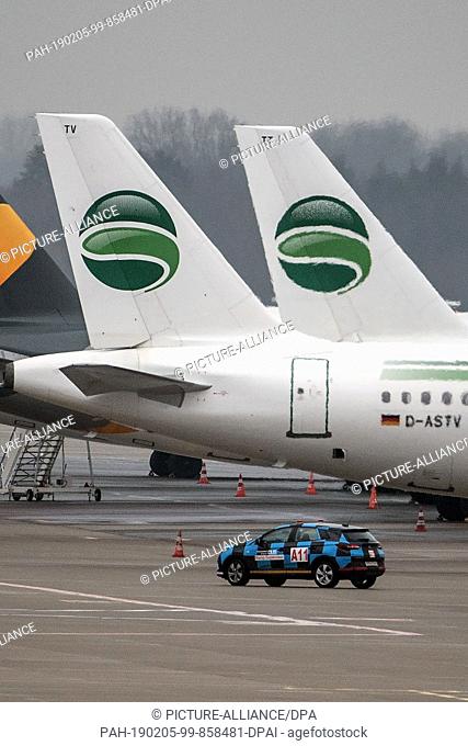 05 February 2019, North Rhine-Westphalia, Düsseldorf: An aircraft of the airline Germania stands at the airport in Düsseldorf