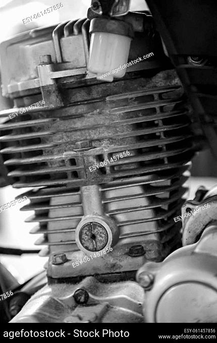 A detailed view of an engine block from a motorcycle