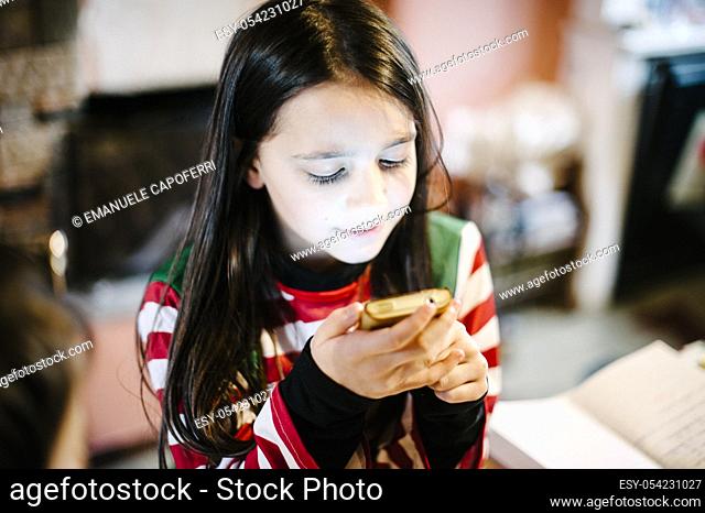 Little girl with smartphone