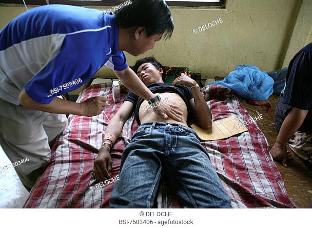 Photo essay for press only. Medical examination on a patient affected by typhoid fever