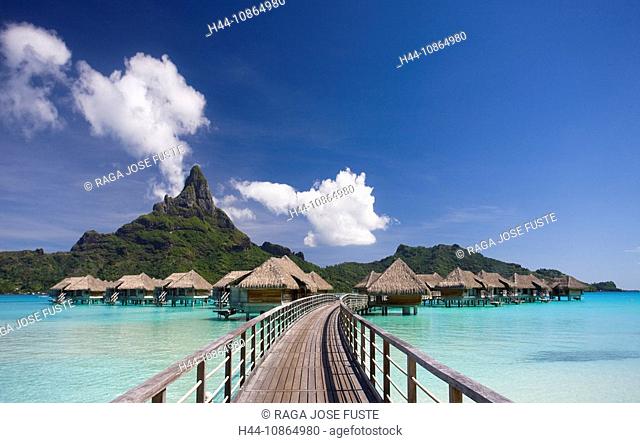 Tahiti, Society Islands, Bora Bora Island, Huts, the lagoon and Mount Pahia