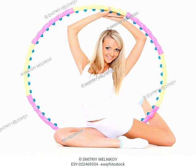 Woman with a hula-hoop. Fitness