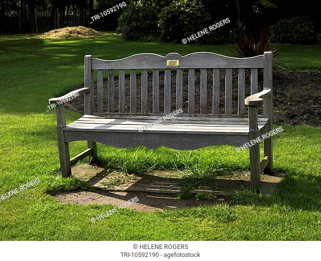 Memorial Bench in Mansion House Gardens Nonsuch Park Cheam Surrey England
