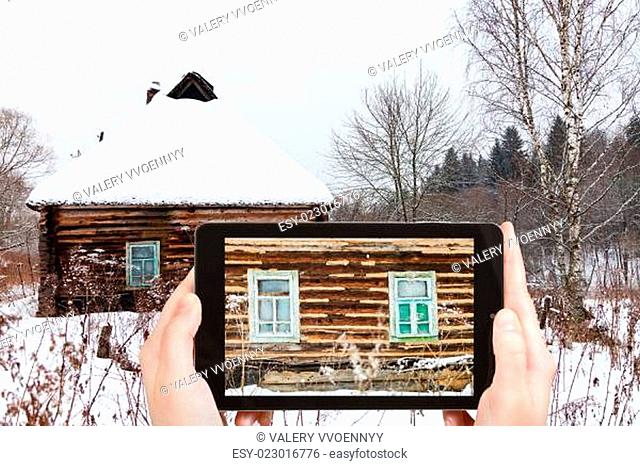 tourist photographs of wall of rustic house