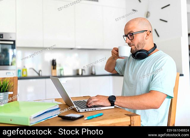 Man working from home during the coronavirus Covid 19 pandemic