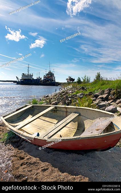 old wooden boat on the seashore, the old ships in the north sea