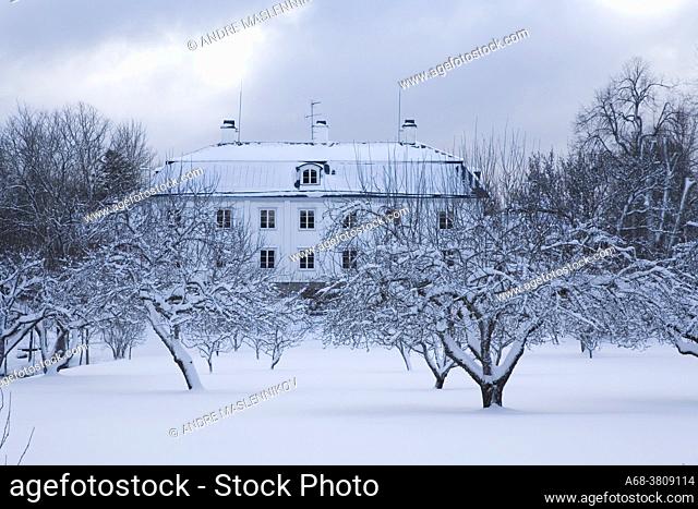 Engelsbergs manor house in the winter in Ängelsberg. Designated a UNESCO World Heritage Site in 1993. The garden with apple trees