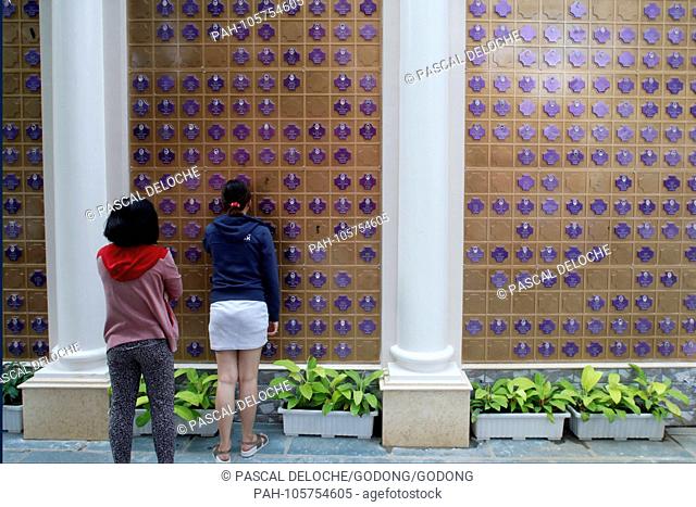 Church of the Sacred Heart of Jesus ( Nha Tho Tan Dinh ). Memorial wall with names of the dead. Ho Chi Minh City. Vietnam. | usage worldwide