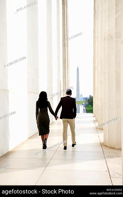 A young Nigerian couple visits the National Mall in Washington, D. C. to celebrate their engagement