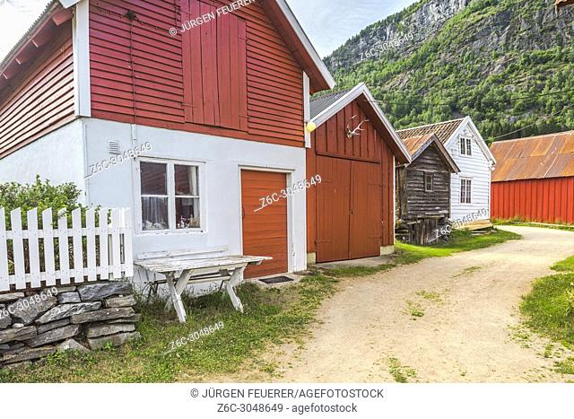pathway through village Solvorn, Norway, huts and houses