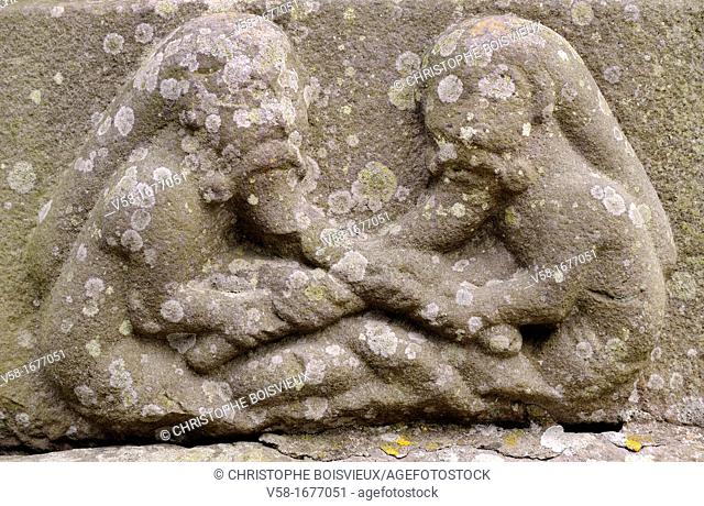 Ireland, County Louth, Monasterboice, Muiredach's High cross 900-923 AD, Two beard-pullers  The beard-pullers are a common motif in early medieval art