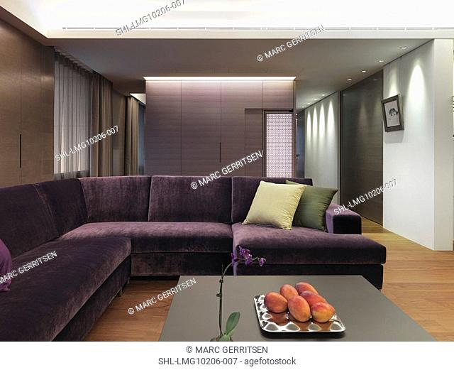 Purple sofa in modern interior