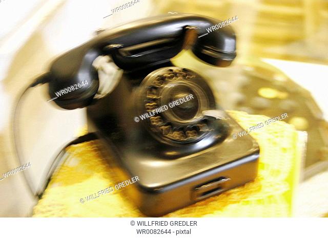 old telephone with rotary dial