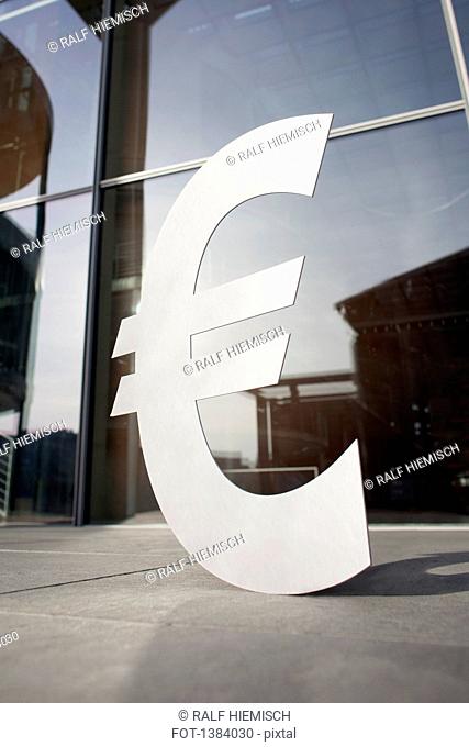 Euro symbol outside office building