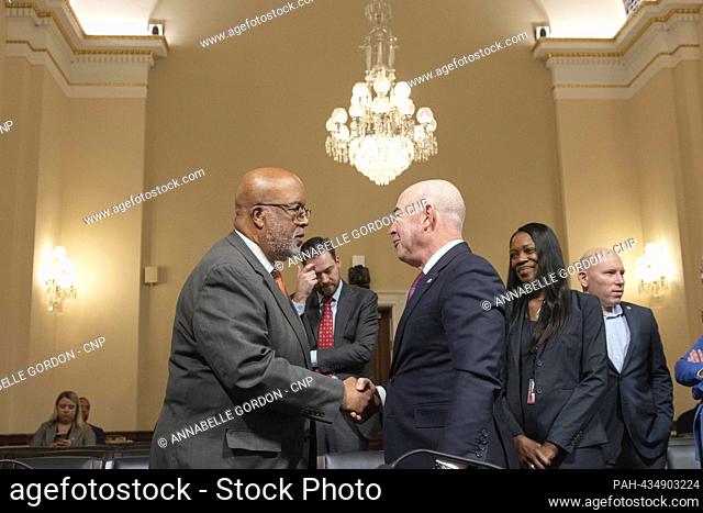 United States Secretary of Homeland Security Alejandro Mayorkas shakes hands with United States Representative Bennie Thompson (Democrat of Mississippi)
