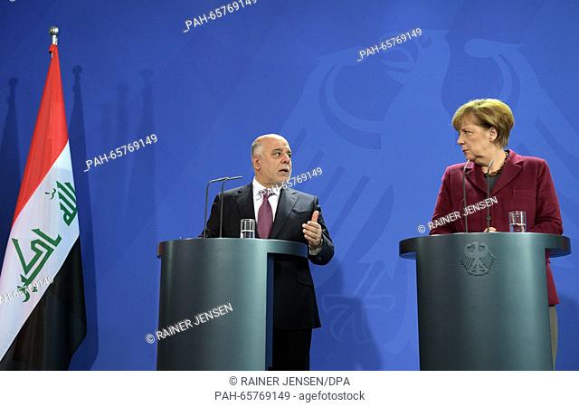 German Chancellor Angela Merkel (CDU) and Iraqi Prime Minister Haider al-Abadi (L) speak during a press conference at the chancellery in Berlin, Germany