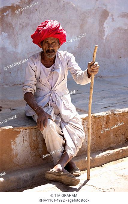 Indian man wearing traditional clothing and Rajasthani turban in village of Nimaj, Rajasthan, Northern India