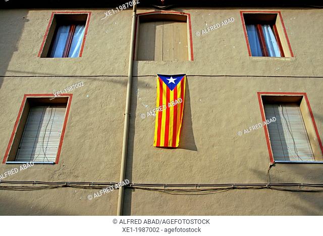 flag, windows, Argelaguer, Garrotxa, Catalonia, Spain