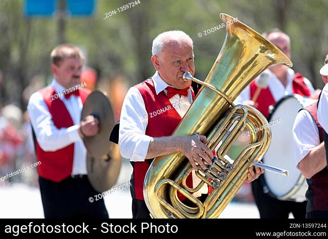 Chicago, Illinois, USA - May 5, 2018: The Polish Constitution Day Parade, A Polish marching band going down the street during the parade