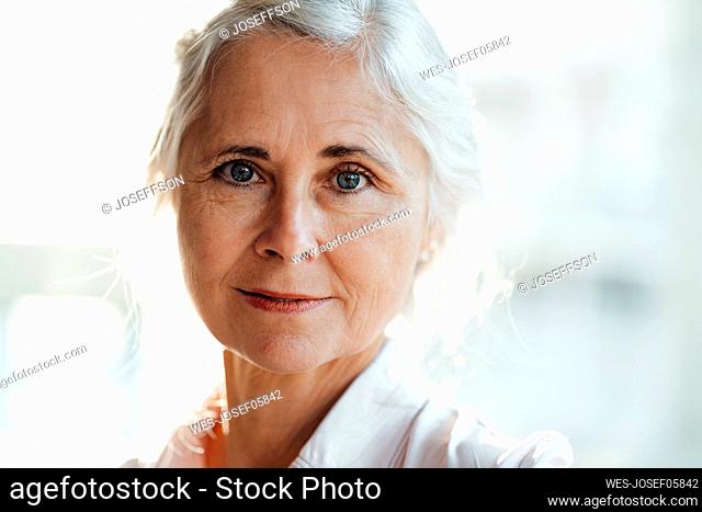Mature woman in cafe
