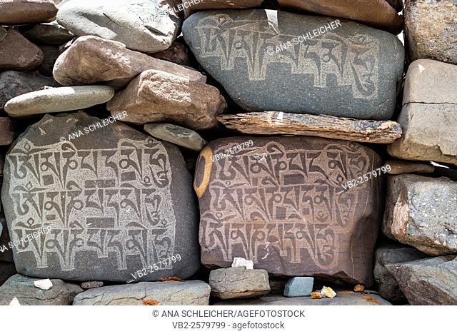 Mani stones with inscriptions. Trekking in Markha valley (Laddakh, India)