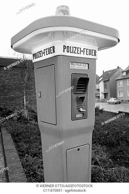 Seventies, black and white photo, emergency telephone to the police and to the fire brigade