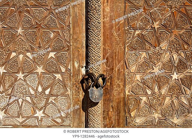 Carved wooden door at the Abdullah Khan Medressa, Bukhara, Uzbekistan