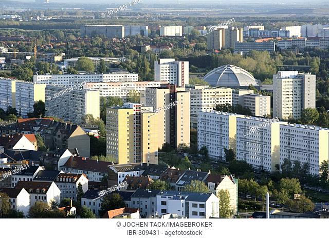City overview, center (in front), Suedvorstadt and Connewitz (behind), multistory buildings at the Strasse des 18. Oktober, cupola of the Kolrabizirkus, Leipzig