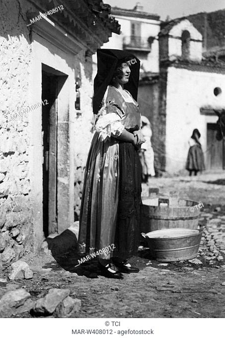 Italy, Basilicata, Pietersburg, a woman in traditional costume, 1940