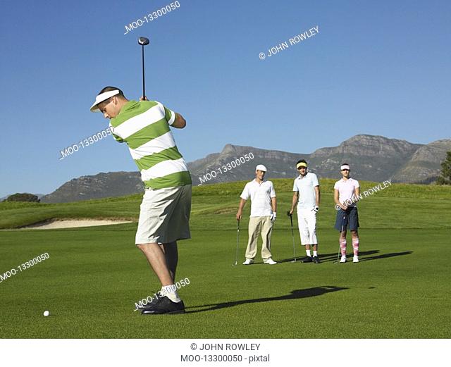 Golfer Teeing Off