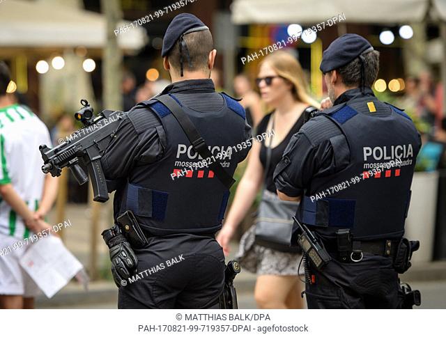 Police guard the popular Las Ramblas district on Sunday, following last week's terrorist attack in Barcelona, Spain, 20 August 2017
