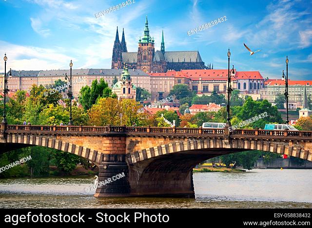 Majestic St Vitus cathedral and Manesuv bridge in Prague