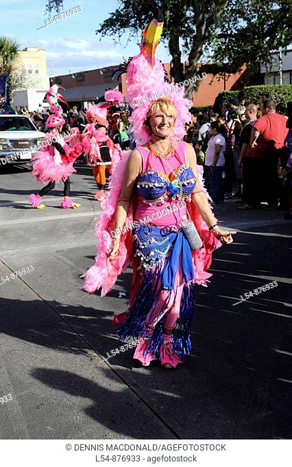 Participants in Pink Flamingo Costumes in Lake Wales Mardi Gras Parade Central Florida United States